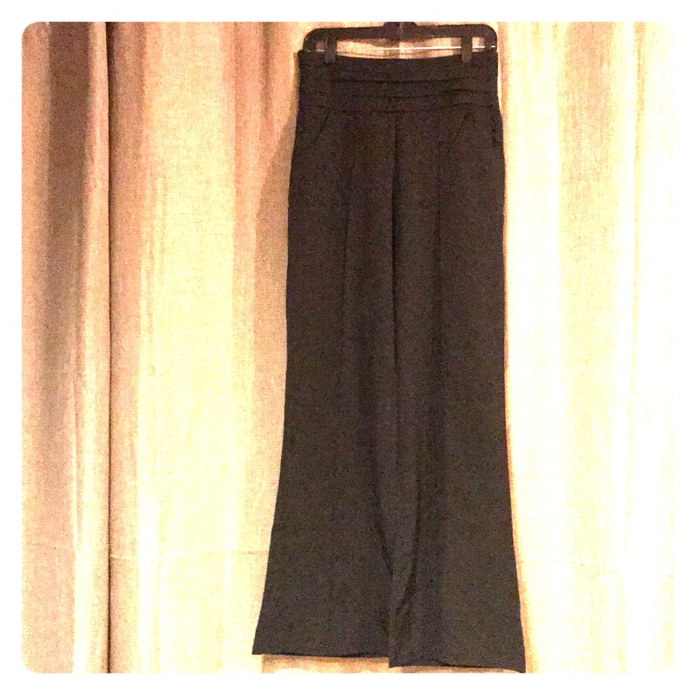 Black flare leg dress pants with unique waistline